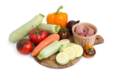Different vegetables and raw meat for stew isolated on white