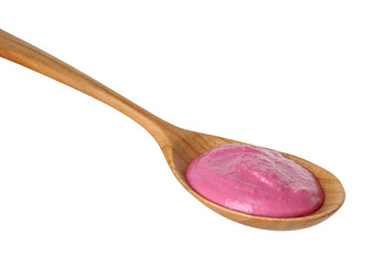 Tasty beetroot hummus in wooden spoon isolated on white