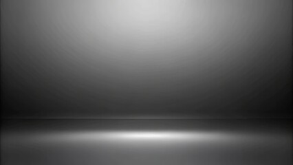 A grayscale image of a single light source illuminating a dark, smooth surface, creating a captivating interplay of light and shadow.