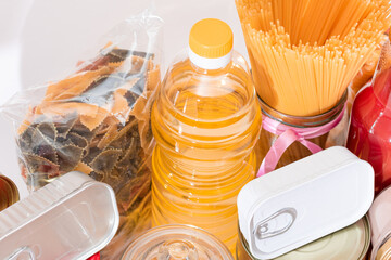 Food Reserves: Canned Food, Spaghetti, Tomato Juice, Pasta and Grocery. Emergency Food Storage in Case of Crisis. Strategic Food Supplies