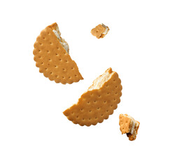 Tasty broken sandwich cookie in air on white background