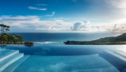A luxury hotel infinity pool with the ocean at its edge