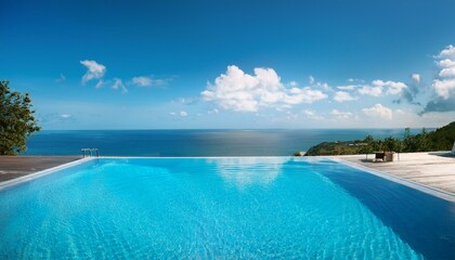 A luxury hotel infinity pool with the ocean at its edge