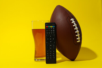 Beer with a rugby ball on a light background