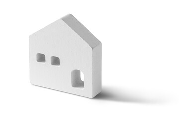 白い模型の家。マイホーム、不動産売買などのコンセプト