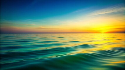 Obraz premium Golden Hues Reflecting on a Serene Seascape, A Symphony of Colors at Sunset