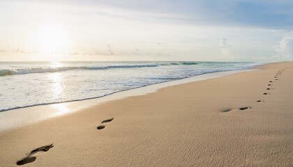 Footprints on the beach sand in the morning