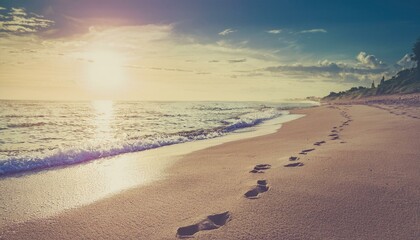 Footprints on the beach sand in the morning