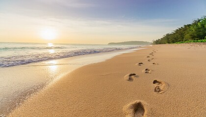 Footprints on the beach sand in the morning