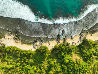 Aerial view of motion blue sea waves