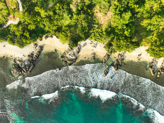 Aerial view of motion blue sea waves