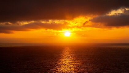 Fototapeta premium A big sun rises under the dark sky