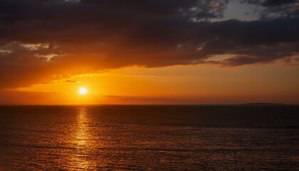 Obraz premium A big sun rises under the dark sky