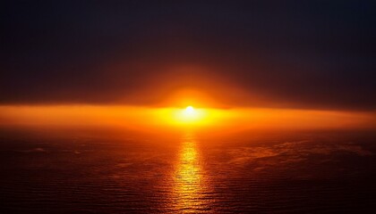 Obraz premium A big sun rises under the dark sky