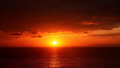 Obraz premium A big sun rises under the dark sky