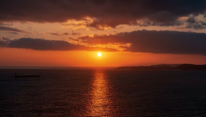 A big sun rises under the dark sky