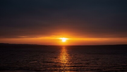 Obraz premium A big sun rises under the dark sky