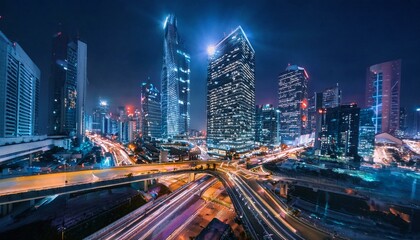 Fototapeta premium Night aerial view of modern infrastructure buildings residential city