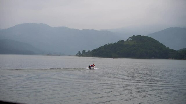 Speed boat with tourist at Umiam Lake Borapani Meghalaya 1