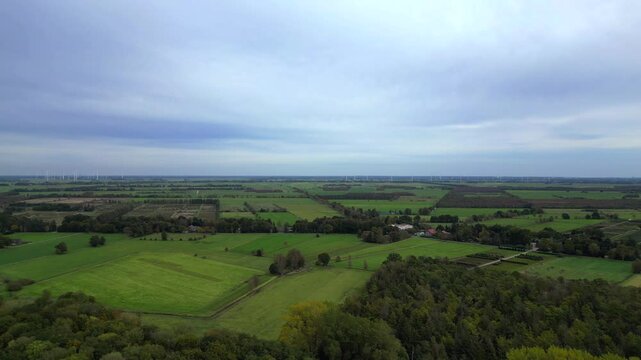 moore plowed field bordering forest in germany Dramatic aerial view flight drone