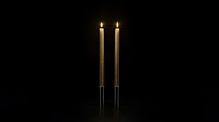Warm Glow of Lit Taper Candles in Minimalist Setting