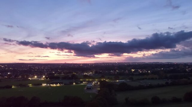 Drone Time-Lapse Over Avery Hill Park New Eltham London at Sunset with Pink Skies and Drifting Clouds