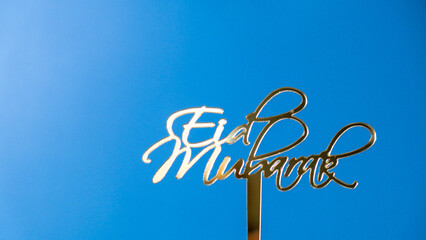 Eid Mubarak text creative conceptual poster design for advertising branding. Mock up template for greeting card postcard. Ramadan Kareem background. Traditional muslim holiday. Copy space