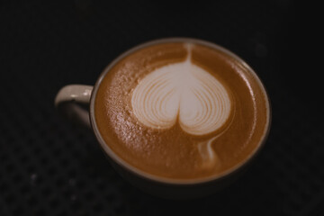 In bustling cafes, the barista crafted a hot drink, blending rich espresso and steamed milk into a latte adorned with intricate art, making each sip a delightful experience.