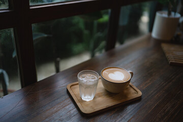 At quaint cafes, the barista skillfully poured a hot drink, crafting a velvety cappuccino topped with rich foam, perfect for breakfast and a delightful caffeine boost.