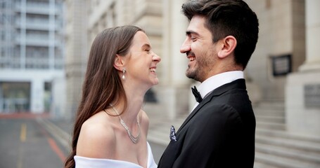 City, building and couple at wedding with smile, love and laughing bride with groom in street together. Urban romance, man and woman with court marriage, commitment and happy outdoor celebration.