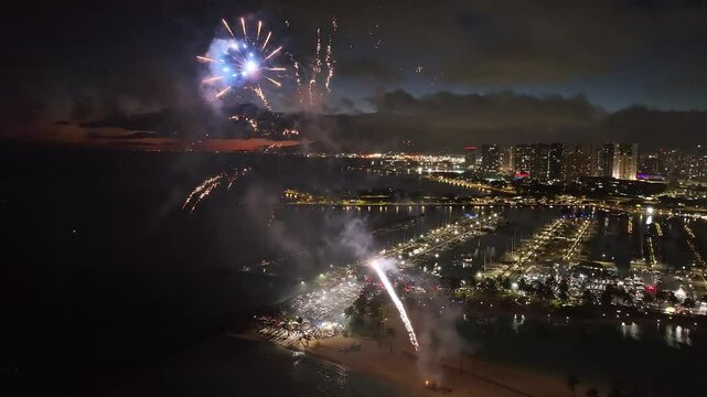Drone flying through fireworks during friday night sunset, Ala Moana Honolulu Hawaii