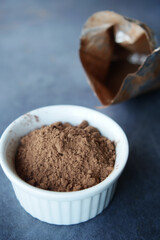 coco powder in a bowl on table,
