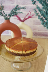  Caramel custard pudding on a plate on table 