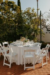 Elegant wedding table setting with flowers and glasses, perfect for a romantic celebration