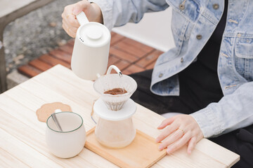 people activity concept with asian woman happy feeling for drip and drink coffee at home with her cat