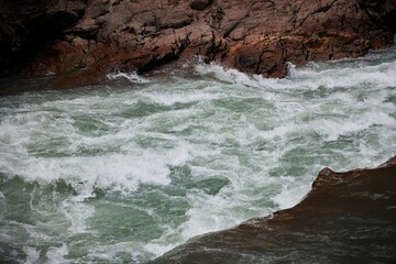 A mountain fast river. The natural landscape.