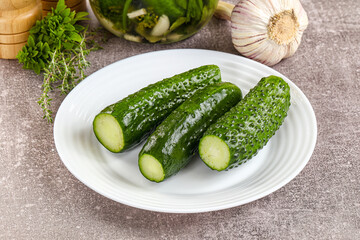 Homemade lighty salted cucumbers with herbs