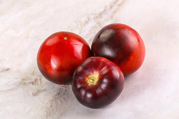 Black ripe juicy organic tomato