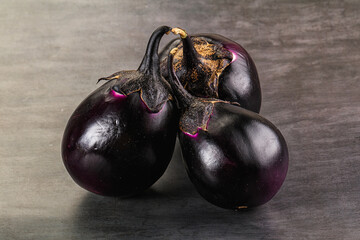 Raw violet and black eggplant