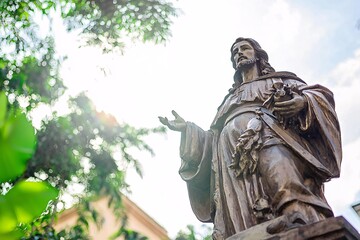 The Saint Rocco statue elegantly rises in the city, featuring detailed craftsmanship that reflects deep devotion and rich history.