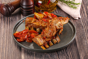 Baked lamb ribs with vegetables