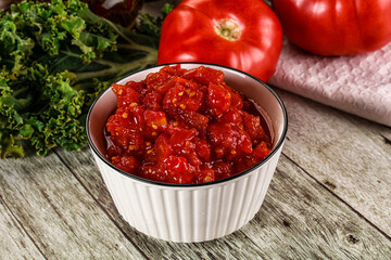 Diced ripe tomato with sauce