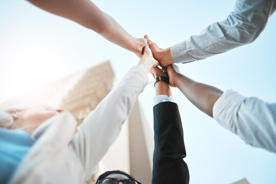 Group of people, high five and solidarity in below for job opportunity, interview or onboarding. Team, business and together for feedback, networking and human resources agency with success as staff