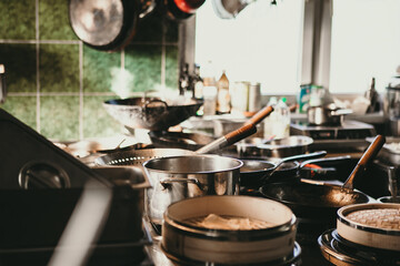 Asian kitchen interior with many dishes