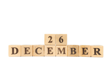 Wooden calendar, a set of dates of the month 26 December, on a white and transparent background close-up. National Candy Cane Day
