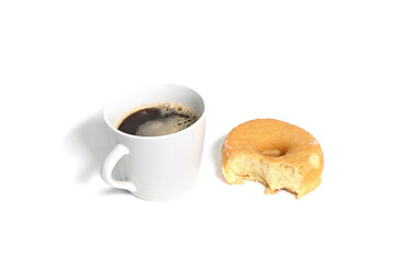 Close-up of a cup of coffee with Donuts on white background, afternoon coffee break.