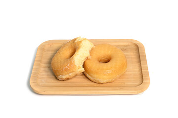 Sweet delicious glazed donuts on white background