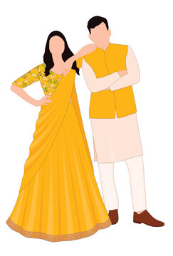 Indian couple in traditional yellow outfit for haldi ceremony