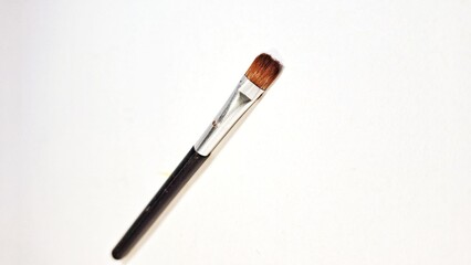 Isolated of used eyebrow pencil black color with white color background. used for drawing eyebrows on women. Brush for eyebrow.