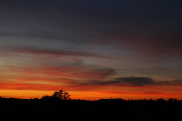 Red sky over the horizon after sunset.

